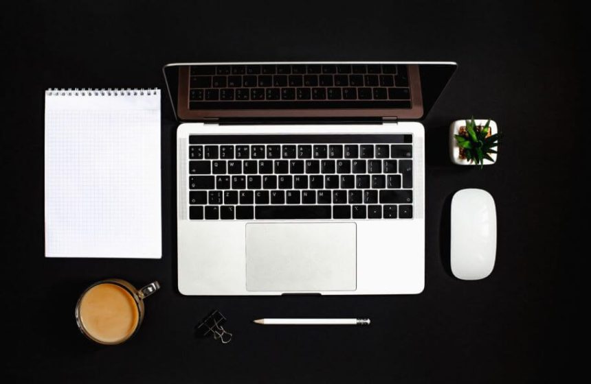 top view desk with office supplies
